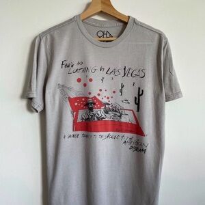 Chaser Gray Hunter S. Thompson’s T-shirt, from  Ralph Steadman art